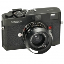 美能达Minolta CLE 相机附带M-Rokkor 2,8/28 mm镜头, 1981年