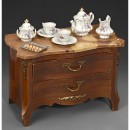 Miniature Marble-Topped Doll's Commode and Porcelain Tea Service