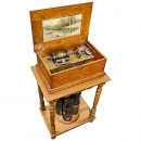 Style B Capital Cuff Musical Box on Cuff Storage Table, c. 1895