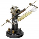 Electro-Magnetic Motor with Rotating Geissler Tube, c. 1880