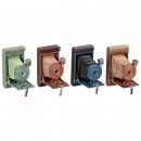 4 Colored Kodak Cameras