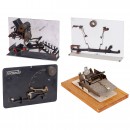 4 Demonstration Models of a Calculating Machine and 3 Typewriter