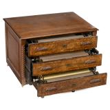 7 Interchangeable Musical Box Cylinders in Fitted Cabinet, c. 18